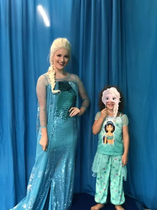 Elsa character visiting a birthday girl at the gym
