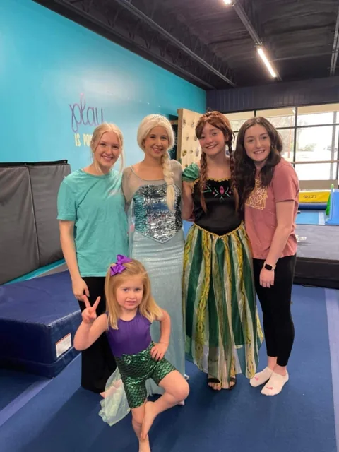 A team of princess characters at a Modern Play party